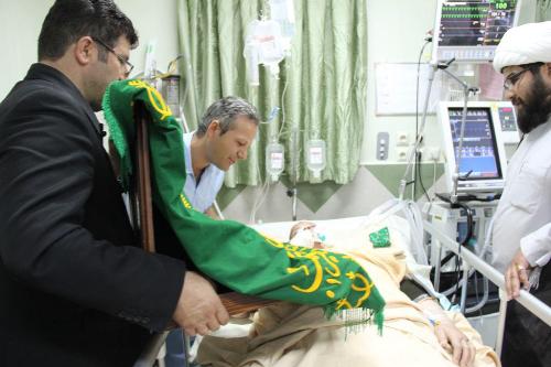 گزارش تصویری عیادت خادمین حرم مطهر رضوی از بیماران بیمارستان های اراک